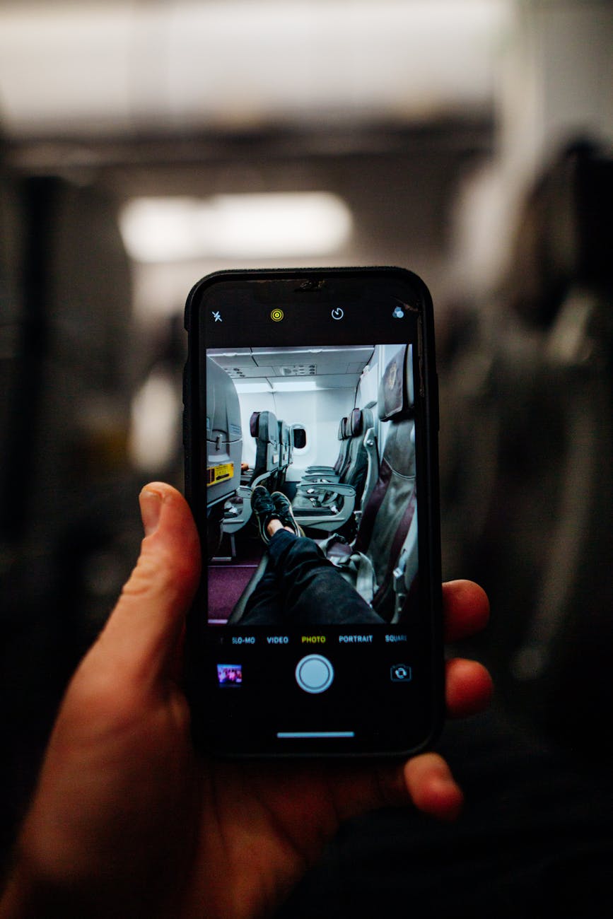 person holding black smartphone